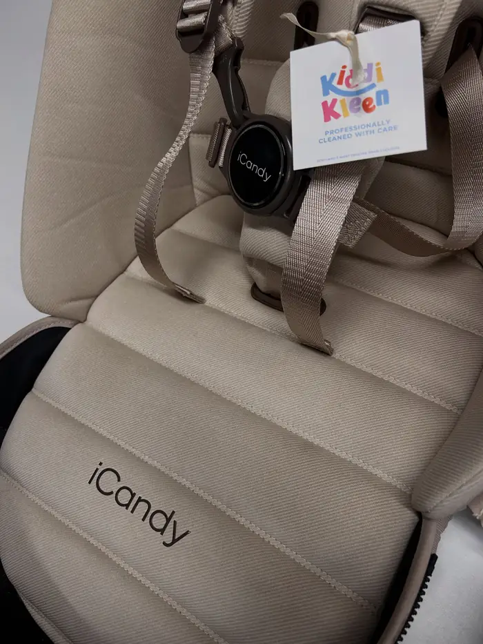A biscuit-coloured iCandy seat unit after cleaning, with a Kiddi Kleen tag